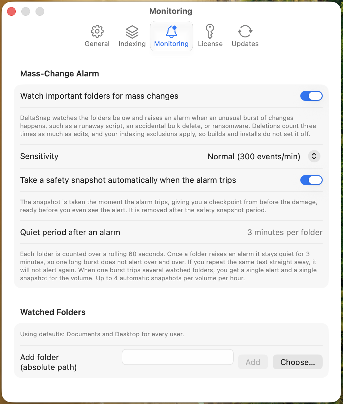 DeltaSnap Monitoring settings with the mass-change alarm enabled, sensitivity, automatic safety snapshot on alarm, and watched folders